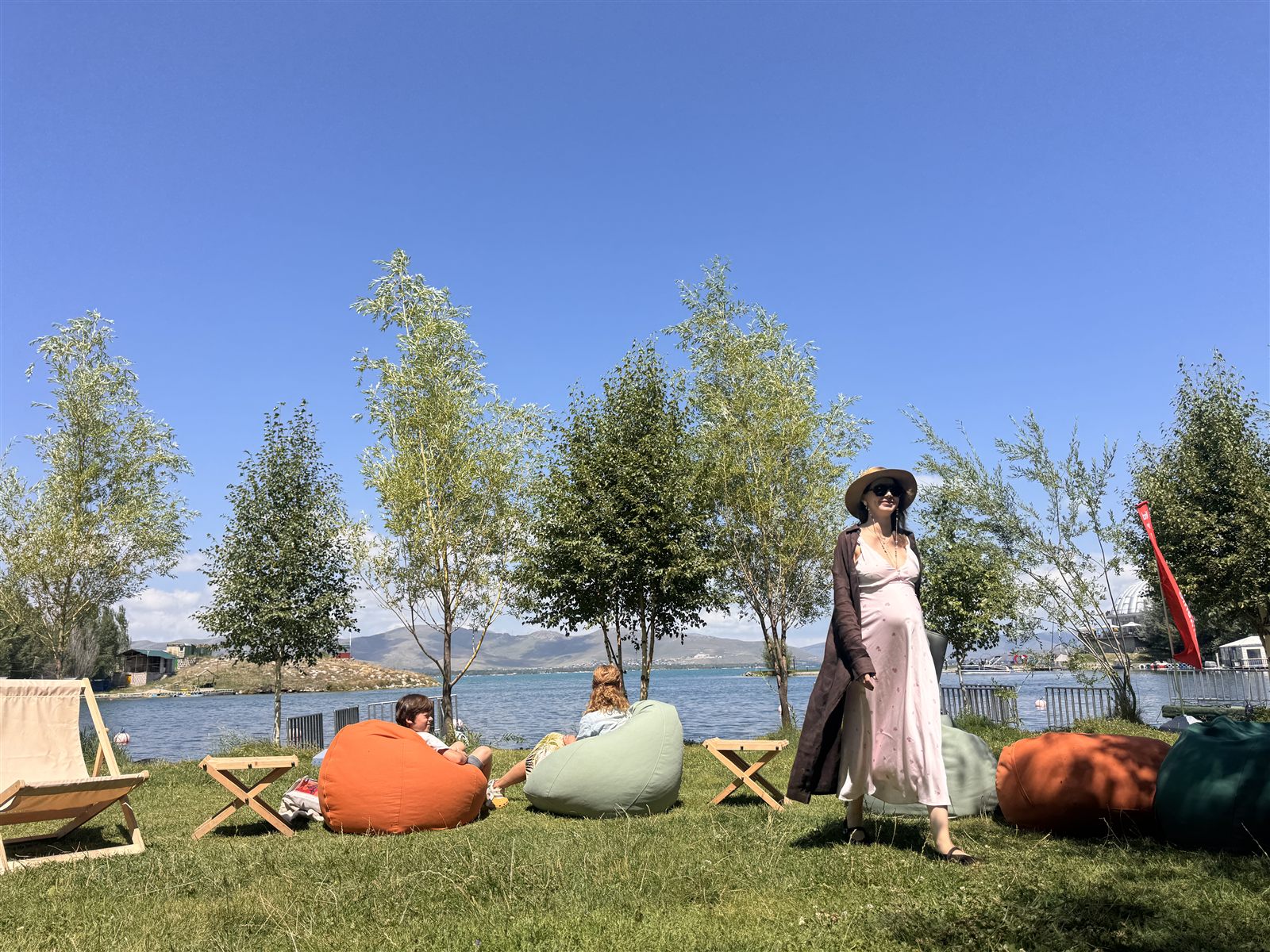 Circle of participants on the shore of Lake Sevan