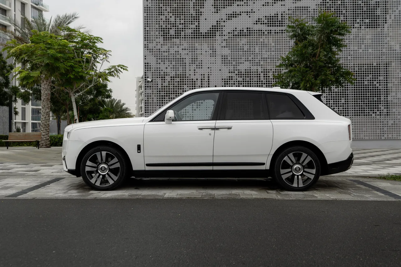 A luxury car queued at the VIP parking entrance