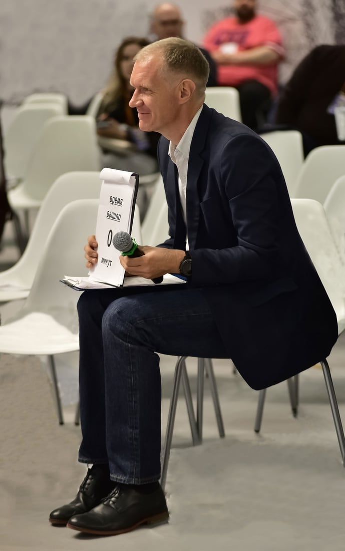 Leonid Bugaev on stage at an event